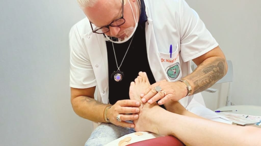 Dr MIkel Foot Palpation